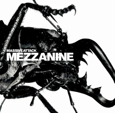 Close up of a black beetle on a white background. with the title of the album and the name of the band in white on the beetle.