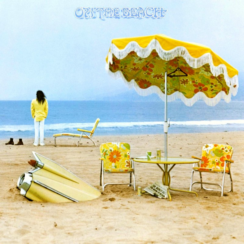 Sur une plage, au premier plan on voit une table pliante avec un parasol jaune et deux chaises pliantes. Le parasol et les chaises sont dans le même tissus jaune à fleur très 60's. Juste à gauche de ça, on voit juste un bout de l'aile arrière d'une voiture américaine jaune et chrome dépasser du sable (une Cadillac, peut être ?). En arrière plan, devant la mer, une personne aux cheveux longs portant une chemise jaune et un pantalon blanc est debout, dos au photographe, face à la mer. À côté de lui, une paire de chaussure et une chaise longue. En haut de la pochette, dans le ciel, le titre de l'album en lettrages psychédéliques bleu entouré de blanc.