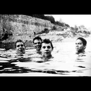 cover of album Spiderland from Slint showing members of the band bathing in a lake