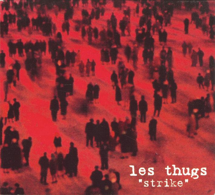 Album cover of Strike from Les Thugs showing people in the street in a red tone