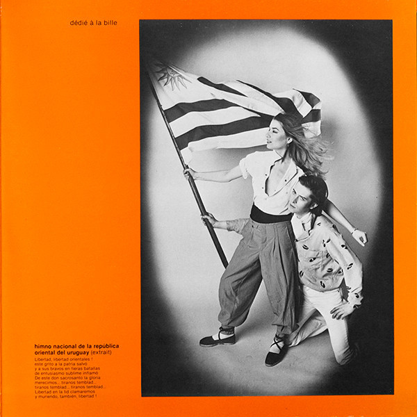 An inner page of the album with a black and white photo of Elli Medeiros and Jacno holding together a big flag of Uruguay.