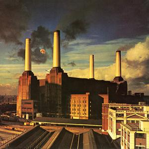 The album cover of Animals from Pink Floyd showing Battersea Power Station in London with a cloudy sky and a flying pig between two of the four chimney.