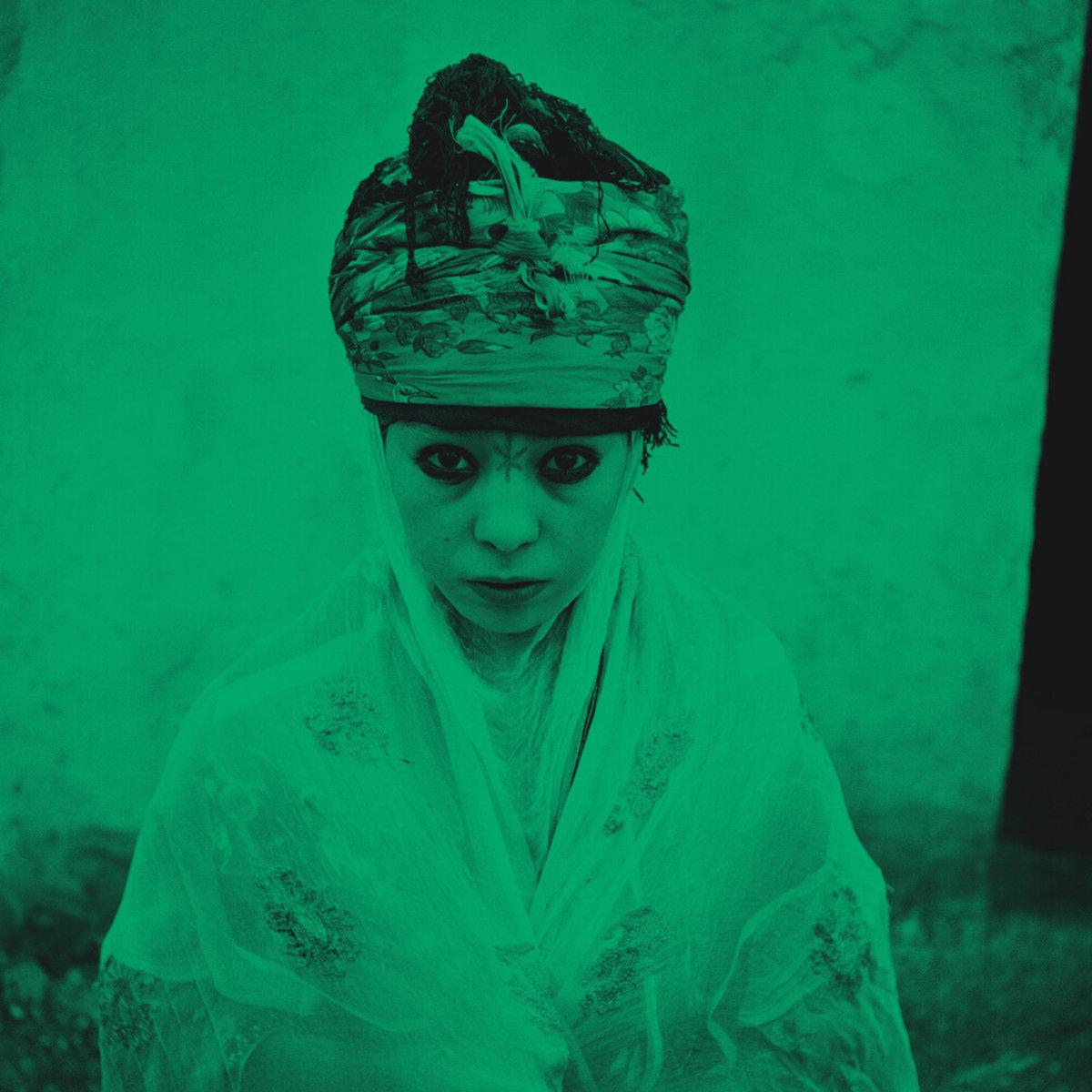 Artwork is a photography of colonial photographer Marc Garanger, re-appropriated and interpreted by Znous.Black and green monochrome