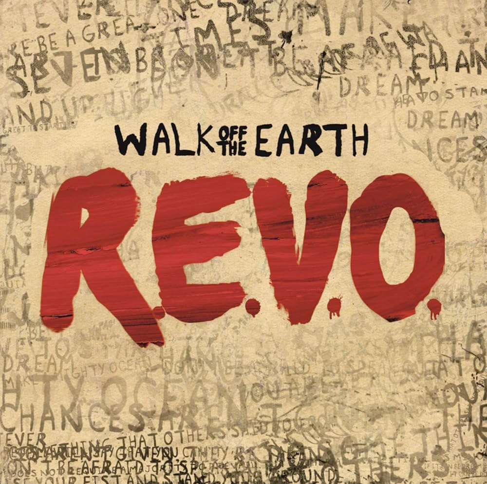 On a light brown textured background, R.E.V.O. is painted in big red letters like a graffiti on a wall, surrounded by a lot of words and sentences but faded, next to the name of the band handwritten in black.