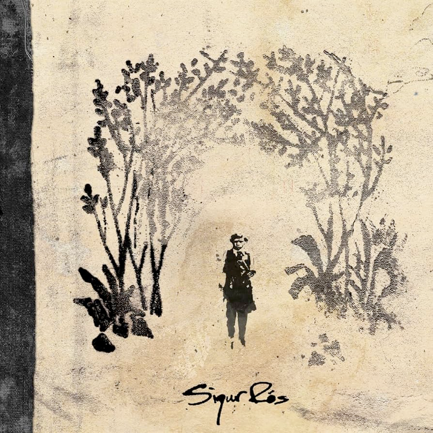 On a light beige textured background, a black printed character is under some plants or trees.